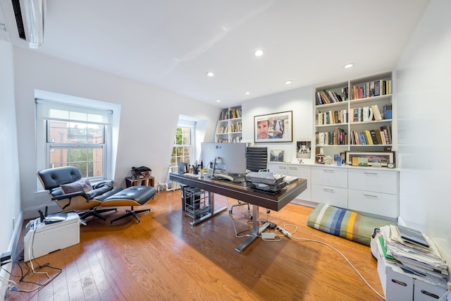 17E 128th St, New York Manhattan, NY 10035 - office featuring light wood-style flooring, recessed lighting, and built in features