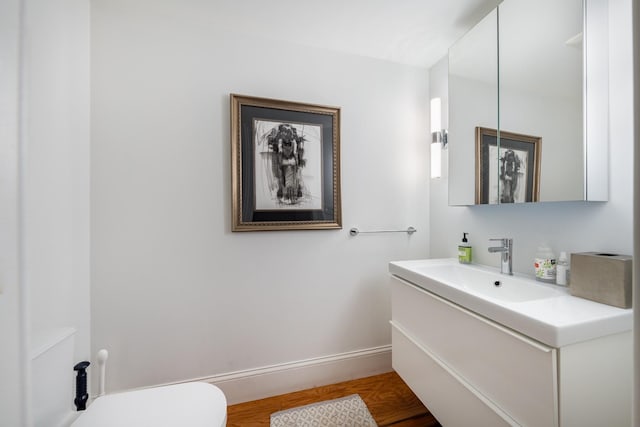 17E 128th St, New York Manhattan, NY 10035 - half bath with vanity and wood finished floors