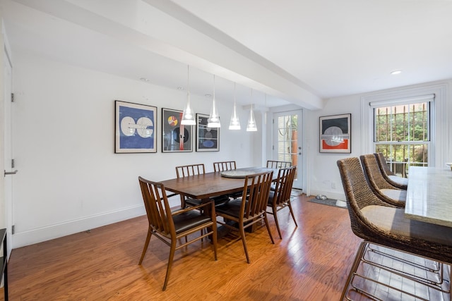17E 128th St, New York Manhattan, NY 10035 - dining space with wood finished floors, recessed lighting, and beam ceiling