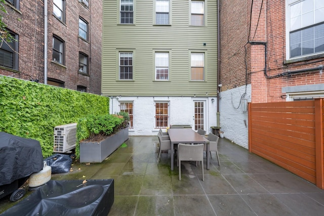 17E 128th St, New York Manhattan, NY 10035 - view of patio featuring outdoor dining space and a grill