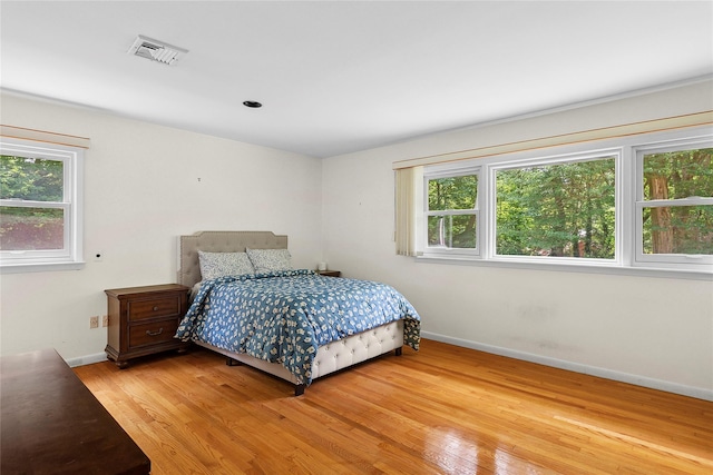 14 Pheasant Hill Ln, Old Brookville, NY 11545 - bedroom featuring multiple windows and light wood-style floors