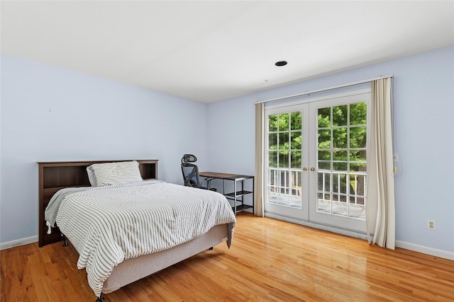 14 Pheasant Hill Ln, Old Brookville, NY 11545 - bedroom featuring french doors, access to outside, and wood finished floors
