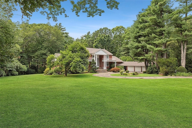 14 Pheasant Hill Ln, Old Brookville, NY 11545 - view of front facade with a front lawn, concrete driveway, and a garage