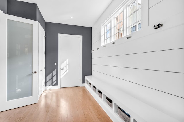 7 Honeysuckle Ln, Rye Brook, NY 10573 - mudroom with light wood-type flooring and baseboards