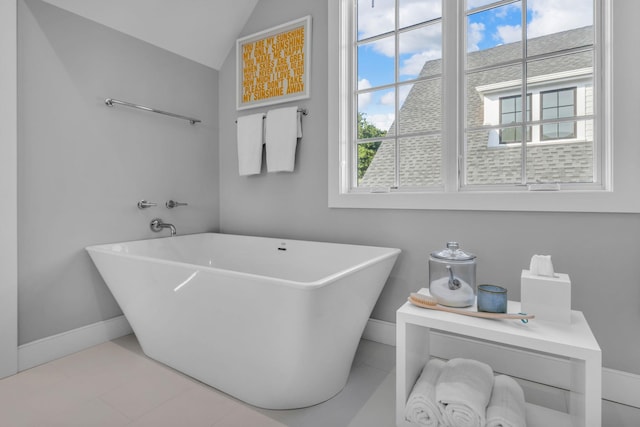 7 Honeysuckle Ln, Rye Brook, NY 10573 - bathroom with a freestanding tub and vaulted ceiling