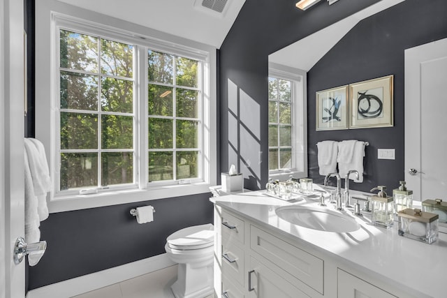 7 Honeysuckle Ln, Rye Brook, NY 10573 - bathroom with vanity, tile patterned flooring, and vaulted ceiling