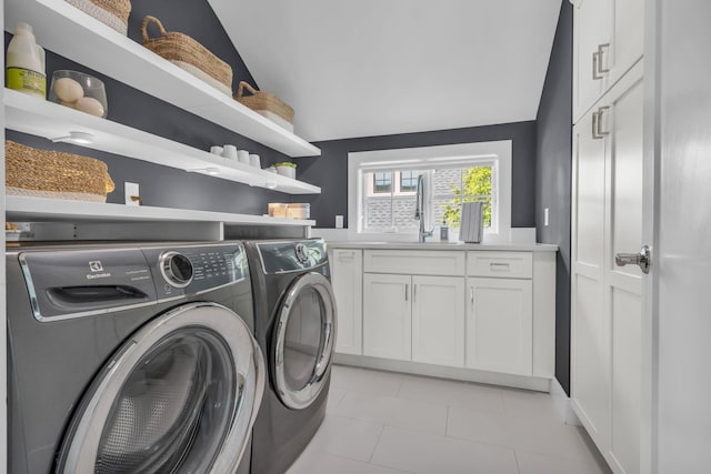 7 Honeysuckle Ln, Rye Brook, NY 10573 - laundry room with independent washer and dryer, cabinet space, and light tile patterned floors