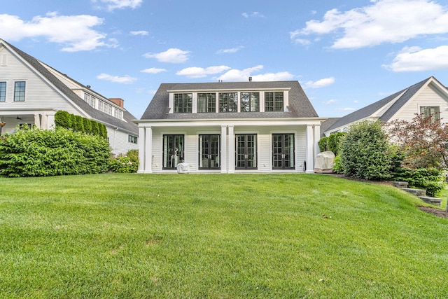 7 Honeysuckle Ln, Rye Brook, NY 10573 - rear view of house featuring french doors, a yard, and a shingled roof