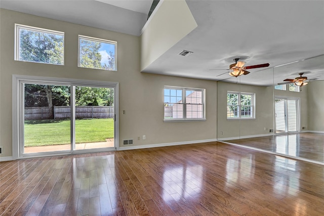 23 Indian Trce, Kings Park, NY 11754 - unfurnished living room featuring wood finished floors and ceiling fan