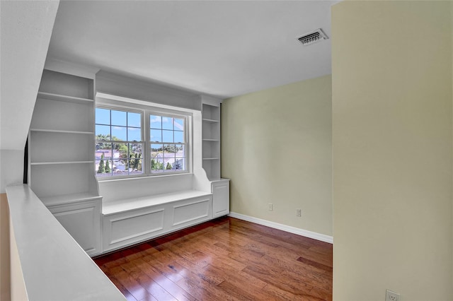 23 Indian Trce, Kings Park, NY 11754 - empty room featuring dark wood-style floors and baseboards