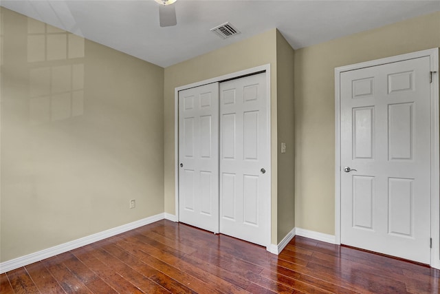 23 Indian Trce, Kings Park, NY 11754 - unfurnished bedroom featuring dark wood-style floors, a closet, and ceiling fan