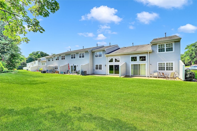 23 Indian Trce, Kings Park, NY 11754 - back of property with a yard and a patio area