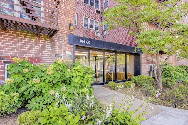 144-60 Gravett Rd Unit 4J, Kew Garden Hills, NY 11367 - property entrance featuring brick siding