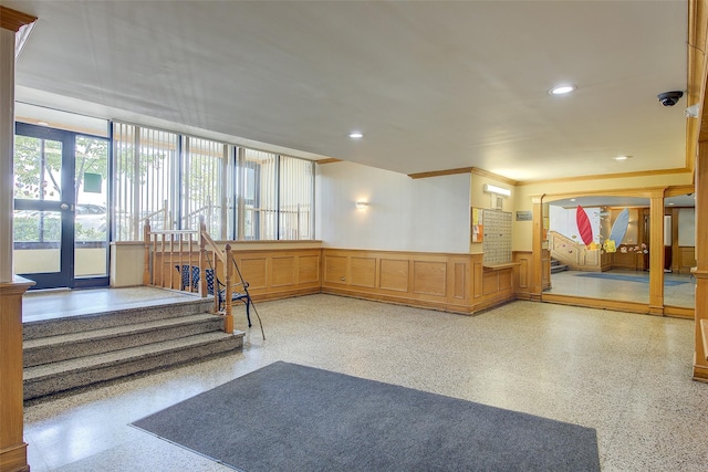 144-60 Gravett Rd Unit 4J, Kew Garden Hills, NY 11367 - lobby with a decorative wall, wainscoting, stairs, a surveillance system, and recessed lighting