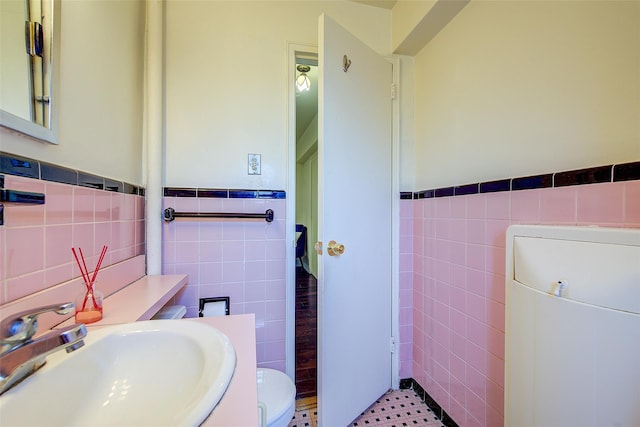 144-60 Gravett Rd Unit 4J, Kew Garden Hills, NY 11367 - bathroom with tile walls, wainscoting, and vanity