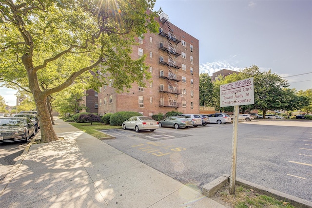 144-60 Gravett Rd Unit 4J, Kew Garden Hills, NY 11367 - view of apartment building / complex featuring uncovered parking