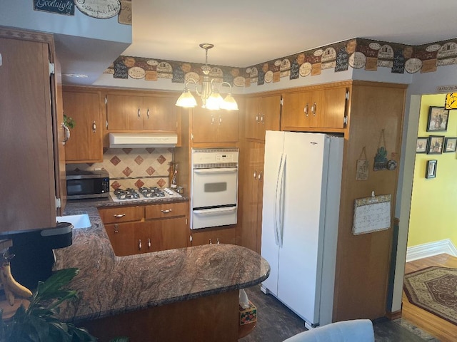 15916 92nd St, Howard Beach, NY 11414 - kitchen featuring white appliances, custom exhaust hood, a warming drawer, and brown cabinetry