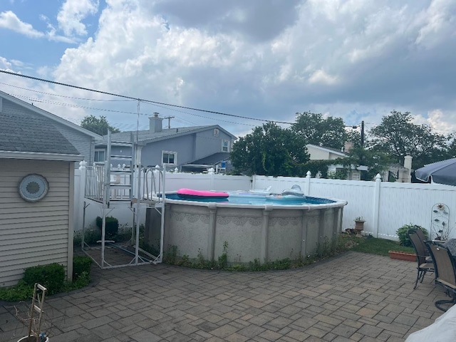 15916 92nd St, Howard Beach, NY 11414 - fenced backyard with a patio