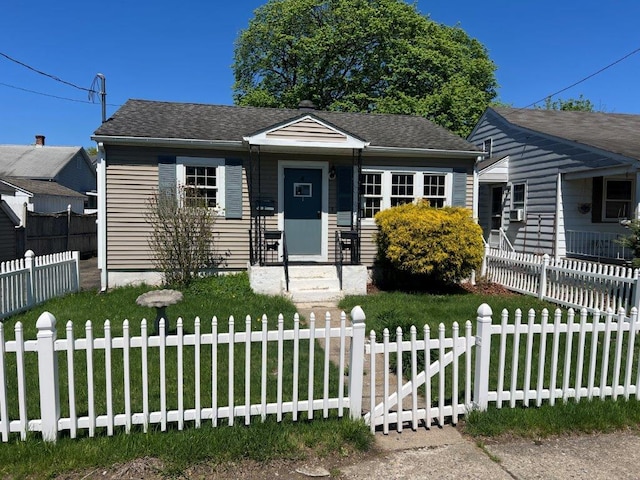 4 Harold St, Port Jervis, NY 12771 - bungalow-style home with a fenced front yard and roof with shingles