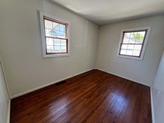 4 Harold St, Port Jervis, NY 12771 - unfurnished room featuring dark wood-style flooring and baseboards