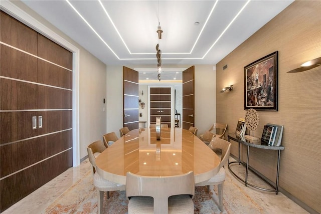 74 River Rd, Nyack, NY 10960 - dining area featuring a tray ceiling and baseboards