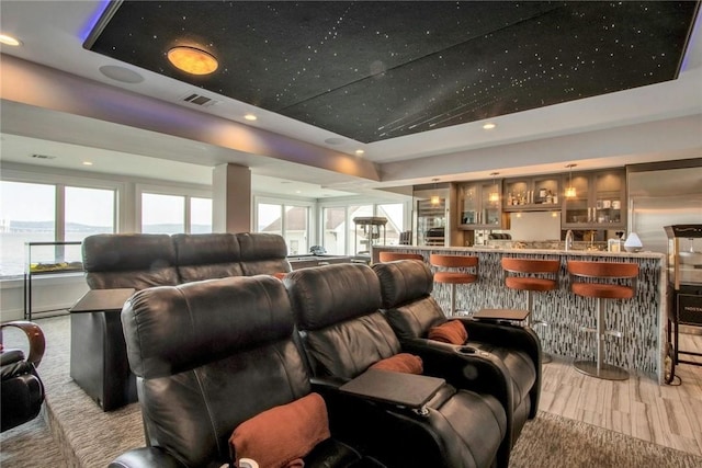 74 River Rd, Nyack, NY 10960 - cinema with a tray ceiling, recessed lighting, a community bar, and light wood finished floors