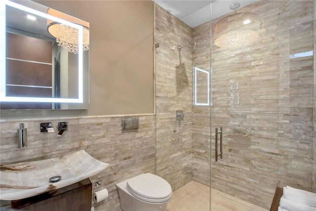 74 River Rd, Nyack, NY 10960 - bathroom with vanity, a shower stall, and tile walls