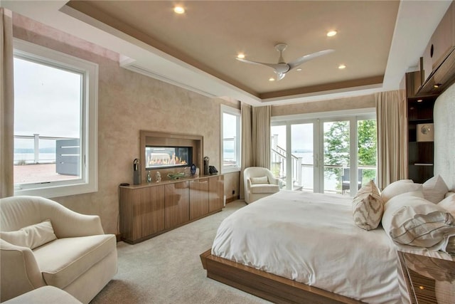 74 River Rd, Nyack, NY 10960 - bedroom featuring a raised ceiling, light colored carpet, multiple windows, and recessed lighting