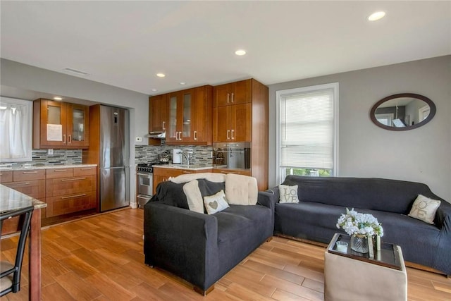 74 River Rd, Nyack, NY 10960 - living area featuring light wood finished floors and recessed lighting