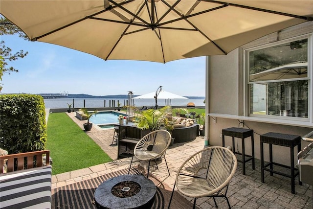 74 River Rd, Nyack, NY 10960 - view of patio / terrace with a water view