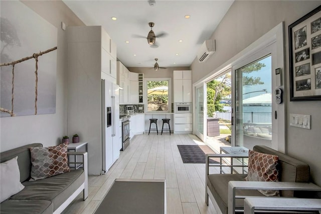 74 River Rd, Nyack, NY 10960 - sunroom / solarium featuring a wall mounted air conditioner