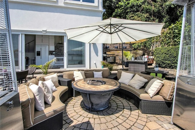 74 River Rd, Nyack, NY 10960 - view of patio / terrace featuring an outdoor living space with a fire pit