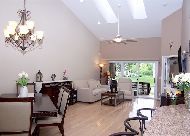 507 Constance Ln, Port Jefferson Station, NY 11776 - living room with high vaulted ceiling, a chandelier, light wood-type flooring, a skylight, and recessed lighting