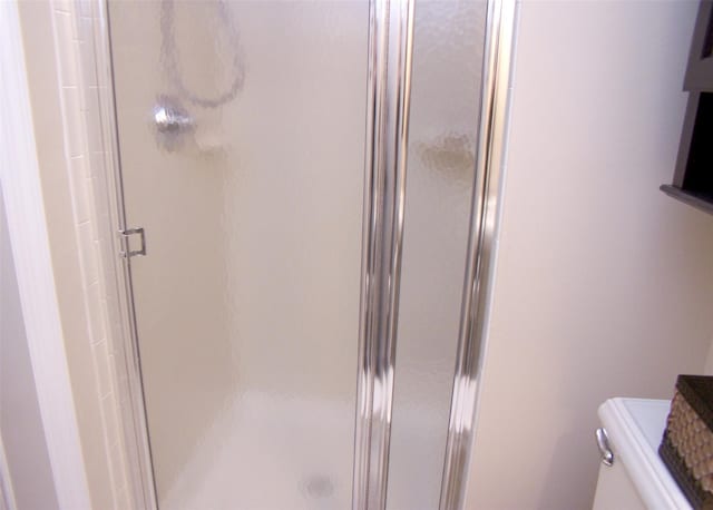 507 Constance Ln, Port Jefferson Station, NY 11776 - full bathroom featuring a shower stall and toilet