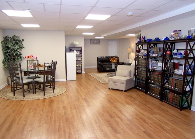 507 Constance Ln, Port Jefferson Station, NY 11776 - dining space with wood finished floors and a drop ceiling
