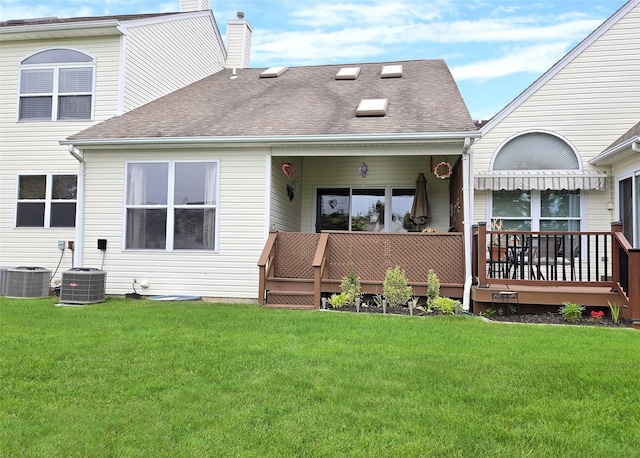 507 Constance Ln, Port Jefferson Station, NY 11776 - rear view of house with a yard, a chimney, roof with shingles, and a deck