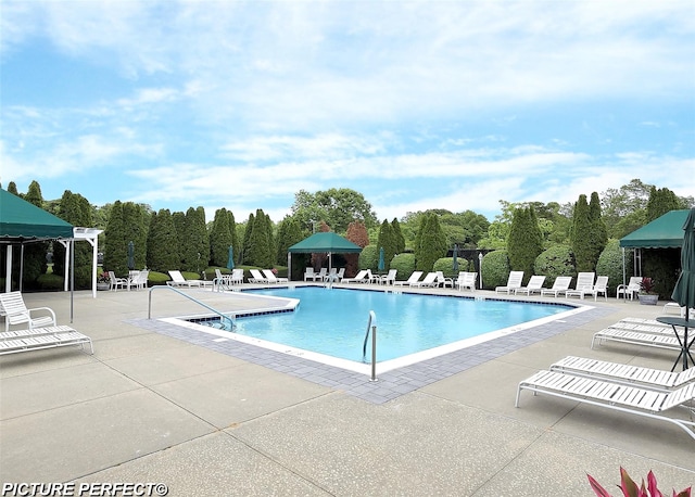 507 Constance Ln, Port Jefferson Station, NY 11776 - community pool with a patio area