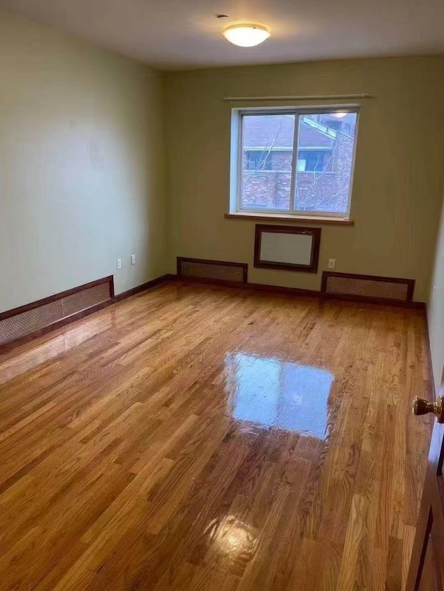 8827 53 Rd Ave Unit 2R, Elmhurst, NY 11373 - unfurnished room featuring wood finished floors