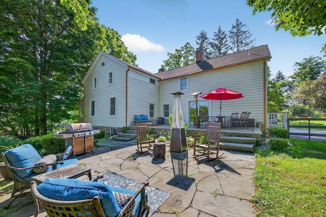 35 Everett Rd, Goshen, NY 10916 - back of house with a patio area and a chimney