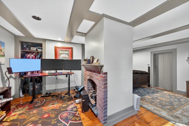 35 Everett Rd, Goshen, NY 10916 - office area with wood finished floors, recessed lighting, and a brick fireplace