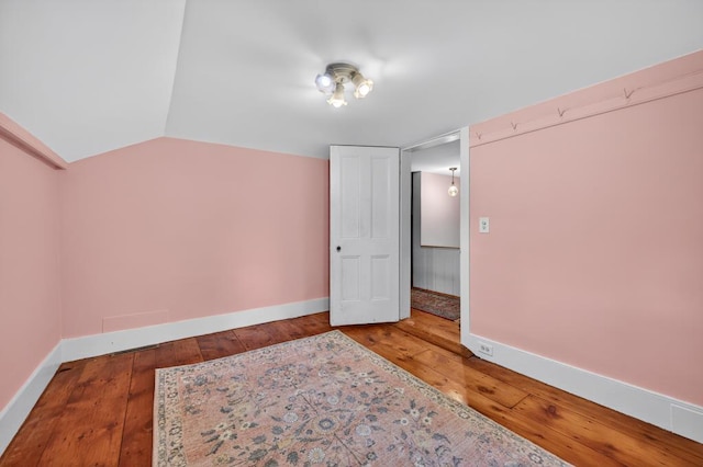 35 Everett Rd, Goshen, NY 10916 - unfurnished bedroom featuring wood-type flooring and lofted ceiling