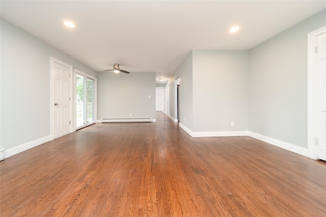 7 Miller Dr, Lake Grove, NY 11755 - unfurnished living room with a ceiling fan, wood finished floors, a baseboard radiator, and recessed lighting
