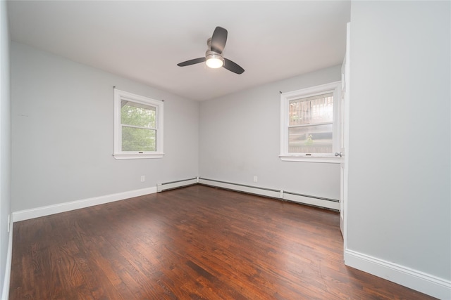 7 Miller Dr, Lake Grove, NY 11755 - empty room featuring a baseboard heating unit, wood finished floors, ceiling fan, and baseboard heating