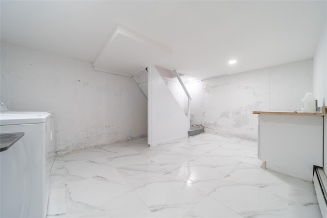 7 Miller Dr, Lake Grove, NY 11755 - unfinished below grade area featuring washer / dryer and a baseboard heating unit