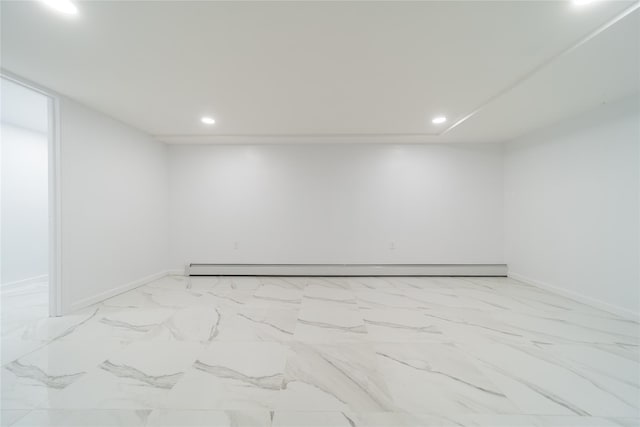 7 Miller Dr, Lake Grove, NY 11755 - empty room with recessed lighting, light marble finish flooring, and a baseboard heating unit