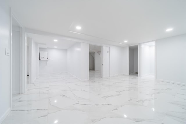 7 Miller Dr, Lake Grove, NY 11755 - finished below grade area featuring recessed lighting and light marble finish floors