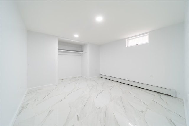 7 Miller Dr, Lake Grove, NY 11755 - basement featuring a baseboard radiator, recessed lighting, and marble finish flooring