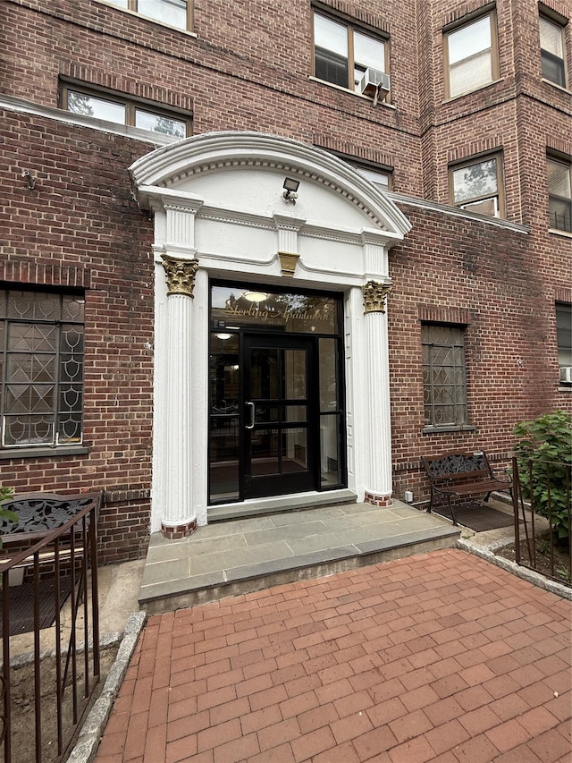 61-41 Saunders St Unit B44, Rego Park, NY 11374 - view of exterior entry with brick siding