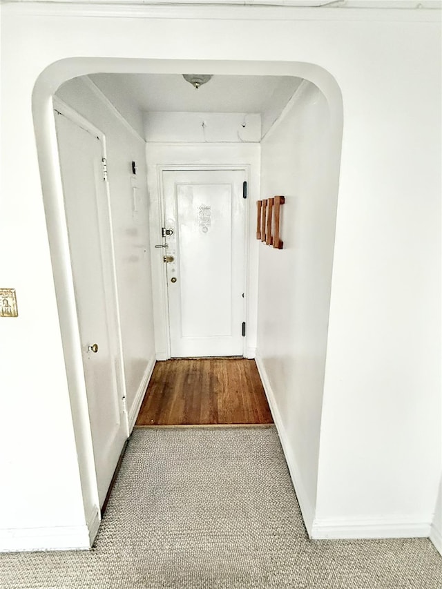 61-41 Saunders St Unit B44, Rego Park, NY 11374 - corridor with arched walkways and baseboards