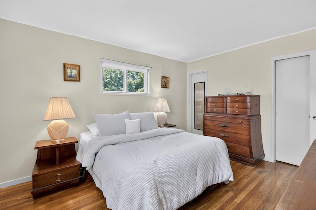 5 Clark St, Plainview, NY 11803 - bedroom with wood finished floors and baseboards